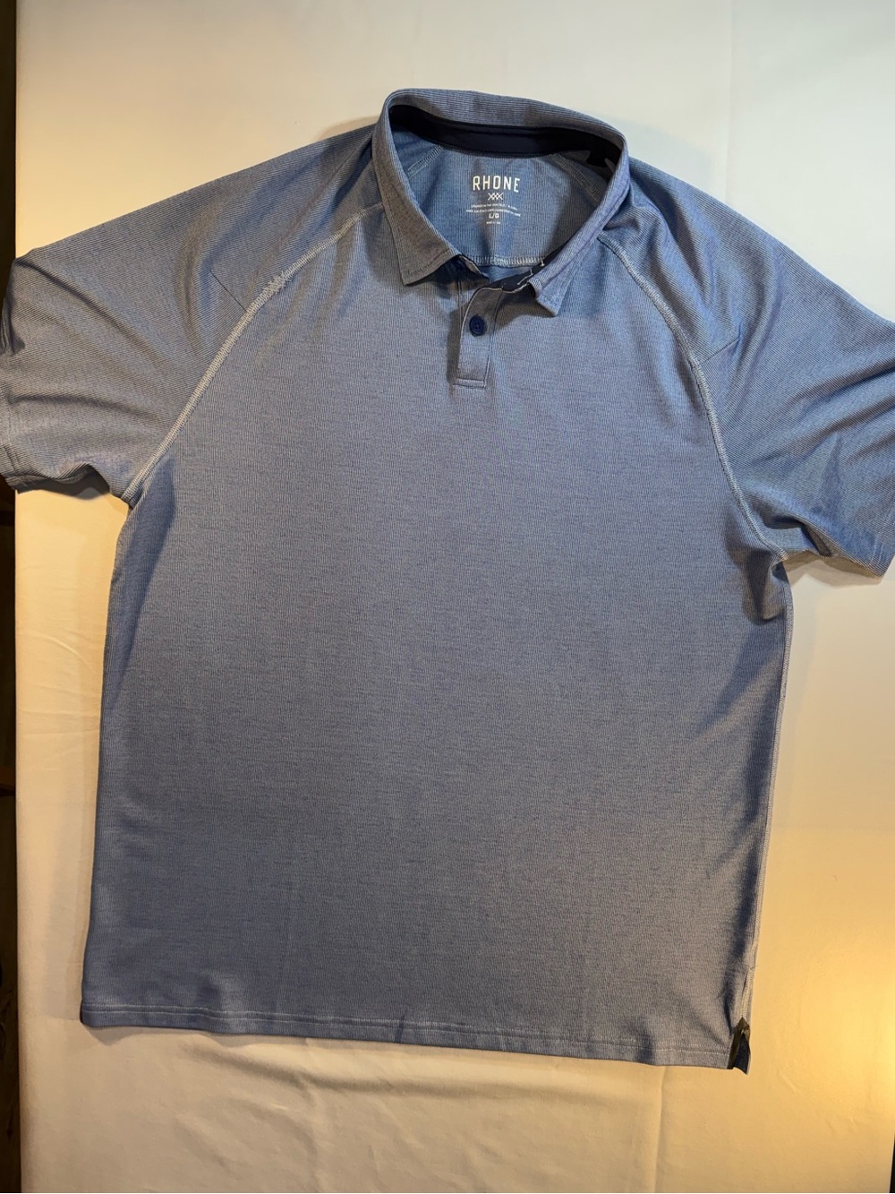 RHONE Men's Heathered Light Blue Performance Polo